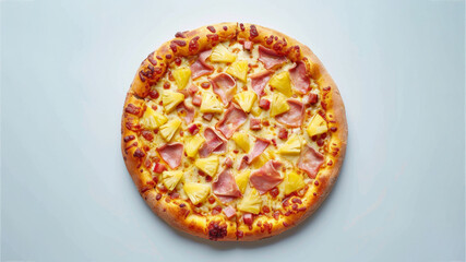 Top view of tropical hawaiian pizza with ham, pineapple and cheese on blue background, copy space
