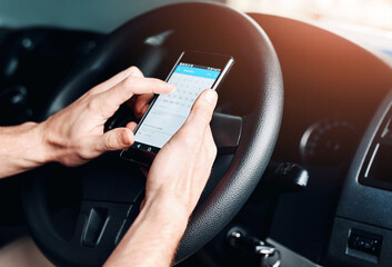 Car, phone and hands of person with calendar for schedule, appointment and reminder. Business, transportation and driver on smartphone for mobile app, planning and online diary on road for travel