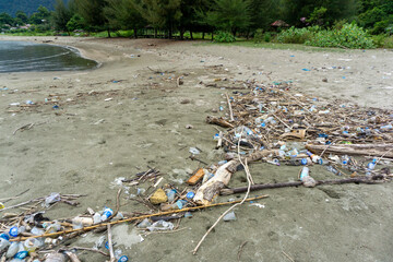 Pollution on the tropical beach. rubbish at sea