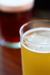 A close-up shot of a plastic cup sitting on a table, with the cup's surface and surrounding area in focus