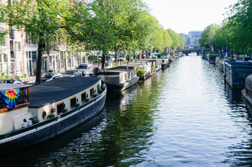 Obraz premium Canal boats in Amsterdam