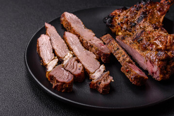 Juicy beef tomahawk steak on the bone baked on the grill