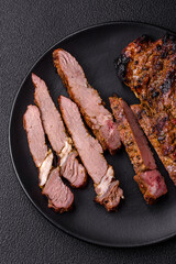 Juicy beef tomahawk steak on the bone baked on the grill