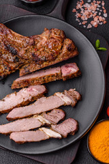 Juicy beef tomahawk steak on the bone baked on the grill