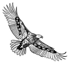 Black silhouette of a soaring bird of prey with outstretched wings