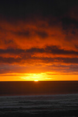 Sun setting in the southern regions in the world across New Zealand