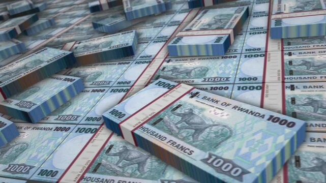 Rwanda money Rwandan francs banknote bundle loop. RWF 1000 money stacks. Concept of business, economy, banking and finance. Camera over cash packs loopable seamless 3d.