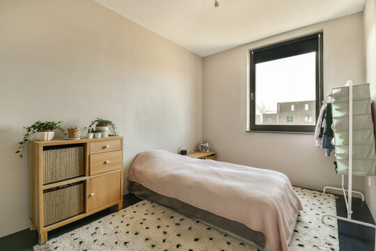 Modern cozy bedroom with minimalist decor at Jan Vrijmanstraat 98