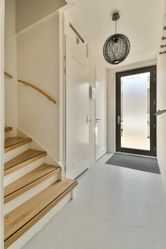 Modern, airy entryway with black wire chandelier, Jan Vrijmanstraat 98