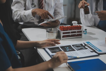 Group of professional medical doctor team meeting training medical in uniform working discussing and talk with patients record, teaching medic team, sit in hospital.health medical care concept