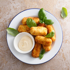 Traditional homemade croquettes with sauce
