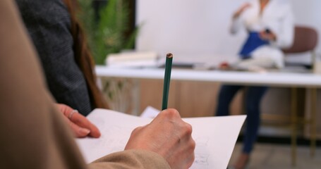 Fashion design seminar attendee taking detailed notes. Engaged student, trendy fashion insights, immersive learning. Capturing creativity, new ideas fashion trends. Educational inspiring, informative.