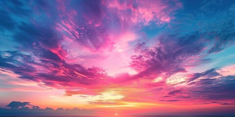 Vibrant Sunset Over the Ocean with Pink and Blue Clouds