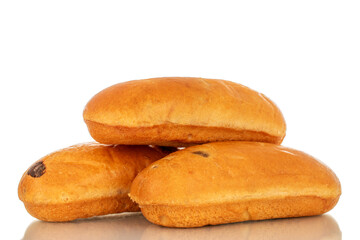 Three sweet buns, macro, isolated on white background.