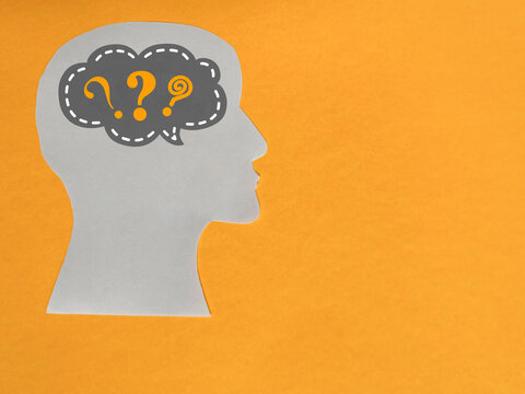 Man's head full of questions or confusion sign background. Symbolizes mental health disorder illness concept such as chaotic thought, depression,anxiety, stress, brain fog and any other emotional prob