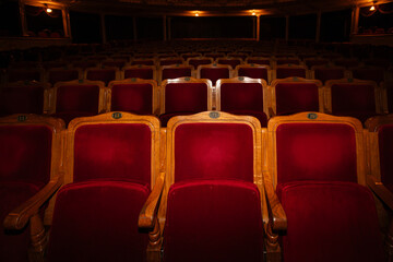 Row of red seats in theatre