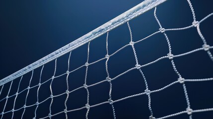 Close-up of a volleyball net, highlighting the net's texture, the plastic coating on the top edge, and the net's attachment to the top bar