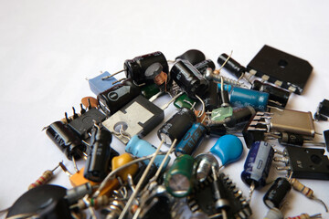 Heap of electronic circuit components.