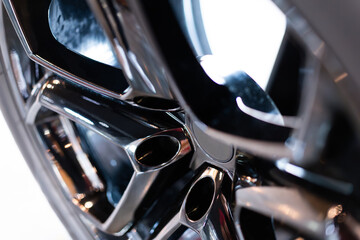 Alloy wheels, rims or alloy wheels, high performance car accessories. bokeh light background