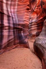 Cardiac Slot Canyon in Arizona shows the unique striped walls formed by thousands of years of flooding and sediment erosion.
