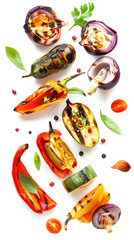 Grilled vegetables levitating in the air isolated on white background