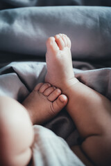 baby feet in bed