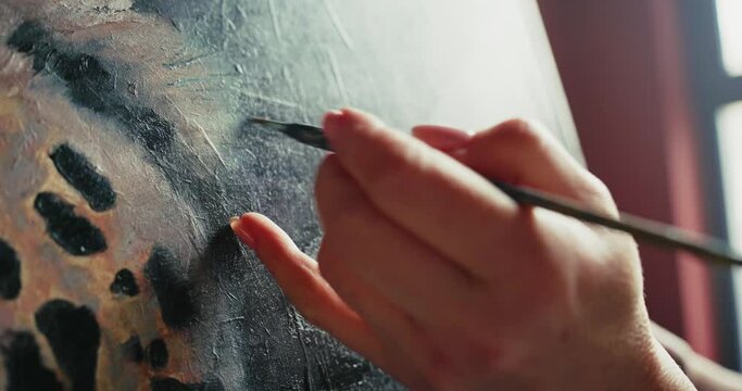 Artist Painting Leopard in Studio