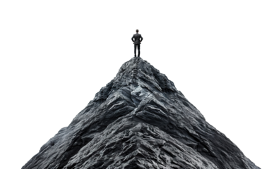 Businessman standing on top of a mountain peak, cut out