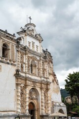 beautiful vertical wide capture of white facade church preserved ruins in spanish colonial town