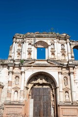 Fototapeta premium church ruins showing facade with moon behind window in ancient spanish colonial town