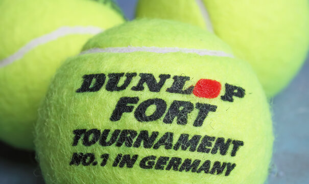 Viersen, Germany - May 9. 2024:  Closeup of yellow Dunlop inner pressure Fort Tournament tennis ball