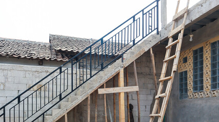 A Newly Constructed Staircase with a View of a Roof