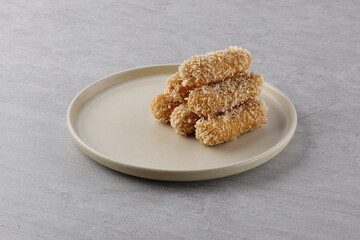 deep-fried cheese sticks in panko breadcrumbs