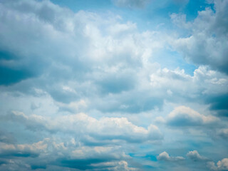 Cloud floating in blue sky with copy space.Water droplets and ice crystals gathered together into clumps. Floating in the azure atmosphere.
