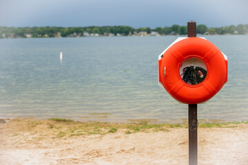 A life ring is stationed along the swimming beach at Pike Lake within Pike Lake Unit, Kettle Moraine State Forest, Hartford, Wisconsin