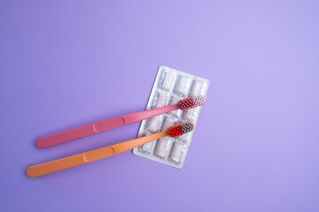 Colored toothbrushes on a color background. Replace your old toothbrush with a new one. Old and new toothbrushes. Dental health and hygiene concept