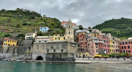 St Margaret of Antioch Church among historical buildings in Vernazza, Italy 