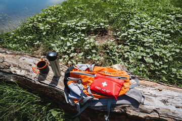 A set of equipment for trekking in nature, everything you need for a trip in the mountains, a safe...