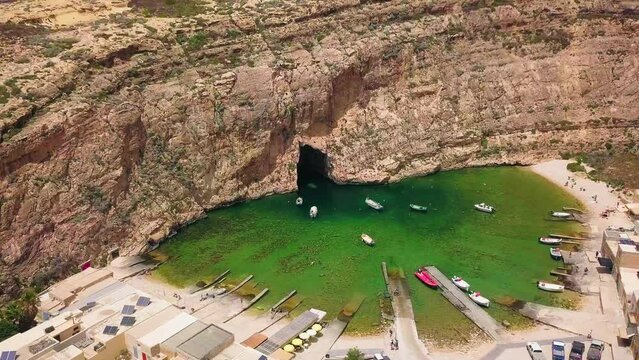 Drone footage fly Around Dwejra inland sea in Gozo island in Malta