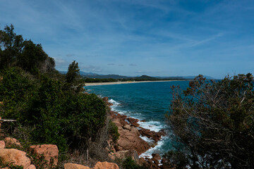 Beautiful view on Perd'e Pera beach and red porphyry rock formations, province of Nuoro, Sardinia (Sardegna) island, Italy. Tyrrhenian Sea.