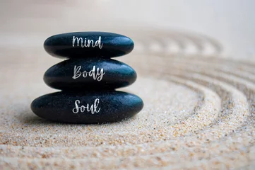 Fotobehang Zen Stenen Mind, body and soul text on Zen stones with sand background  © Maurice Yom