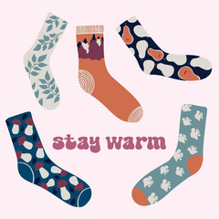 Set of textile socks with leaves, pears, mushrooms, squirrels, mountains and inscription Stay warm, vector, poster, postcard