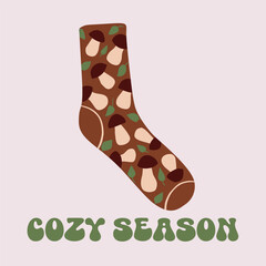 Vector textile sock with mushrooms and leaves, caption Cozy season. Postcard, poster