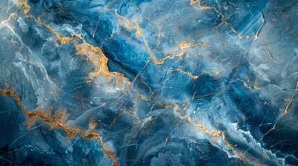 Abstract blue and gold marble texture with swirling patterns.