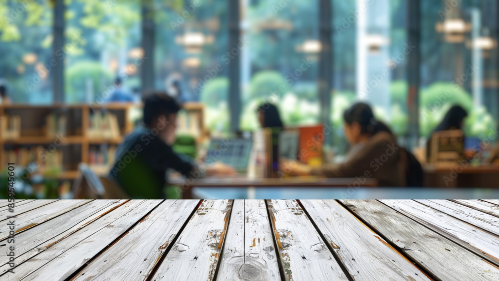 Poster empty wood table top with blur background of library at school or university. the table giving copy 