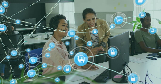 Image of network of connections with icons over diverse business people in office