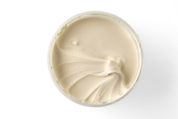 Sour cream full fat yogurt in a transparent bowl isolated on a white background. Top view with copy space