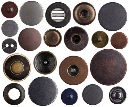 Collection of metal buttons from jeans isolated on a white background. Buttons made of copper, bronze, steel, brass.