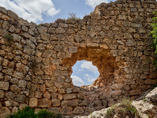 Hole in the wall of the castle of Consuegra in the route of Don Quixote. Cerro Calderico, Consuegra, Province of Toledo, Castilla La Mancha, Spain, Europe