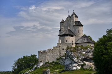 Ruins of a medieval castle on limestone rocks in the village of Bobolice